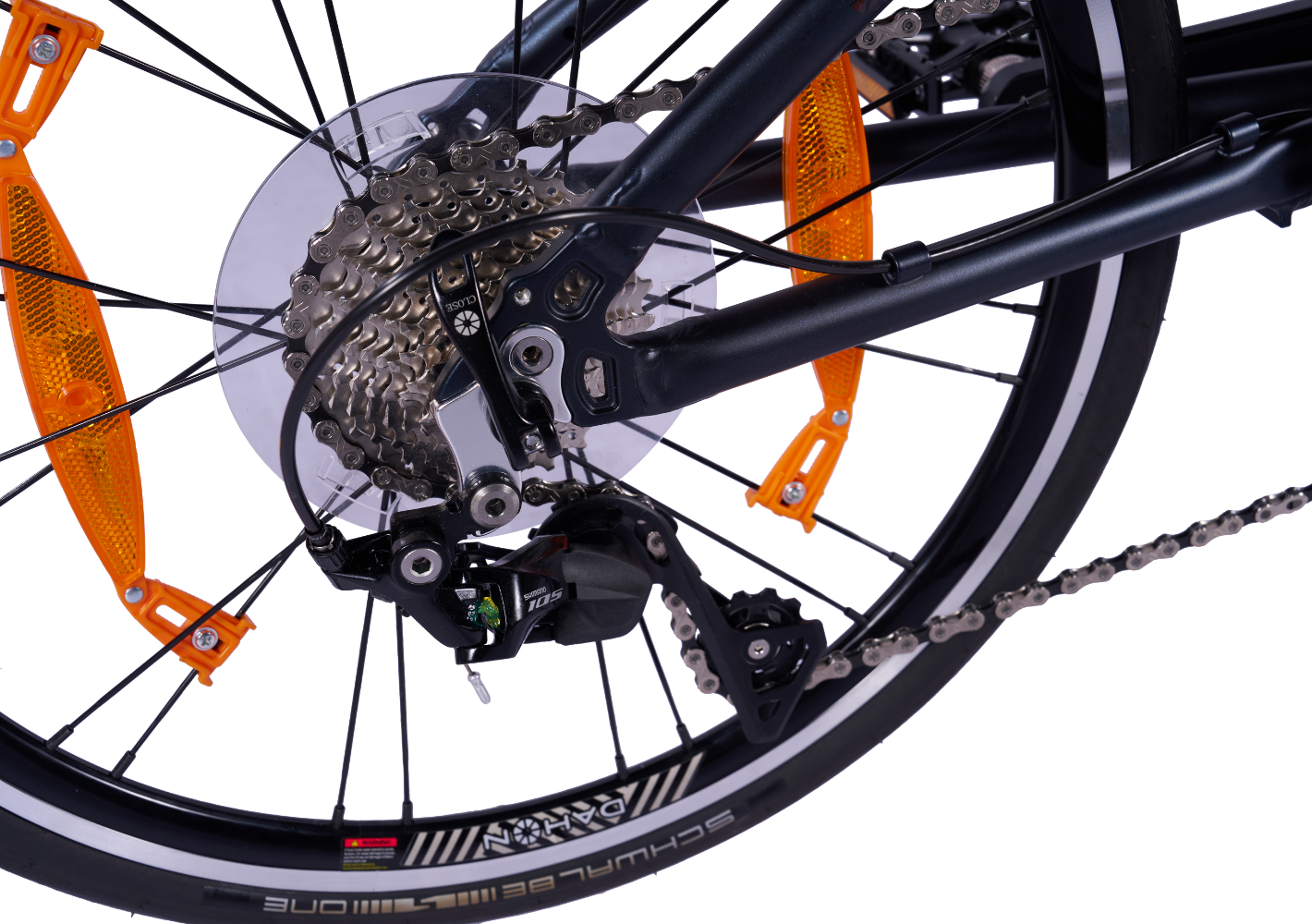 Dahon Mu Pro dark gray bicycle rear drivetrain with derailleur, cassette, chain, and orange spoke reflectors.