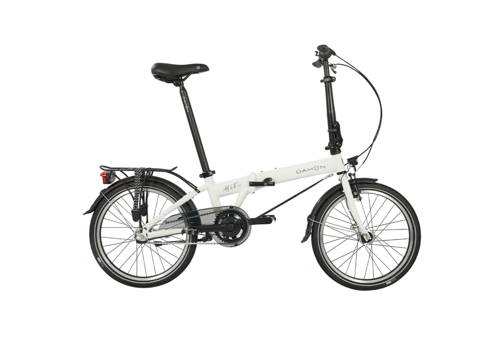 HIT i3 - White Dahon HIT i3 folding bike with black seat, handlebars, and tires. Features rear rack and fender. Ideal for urban rides.