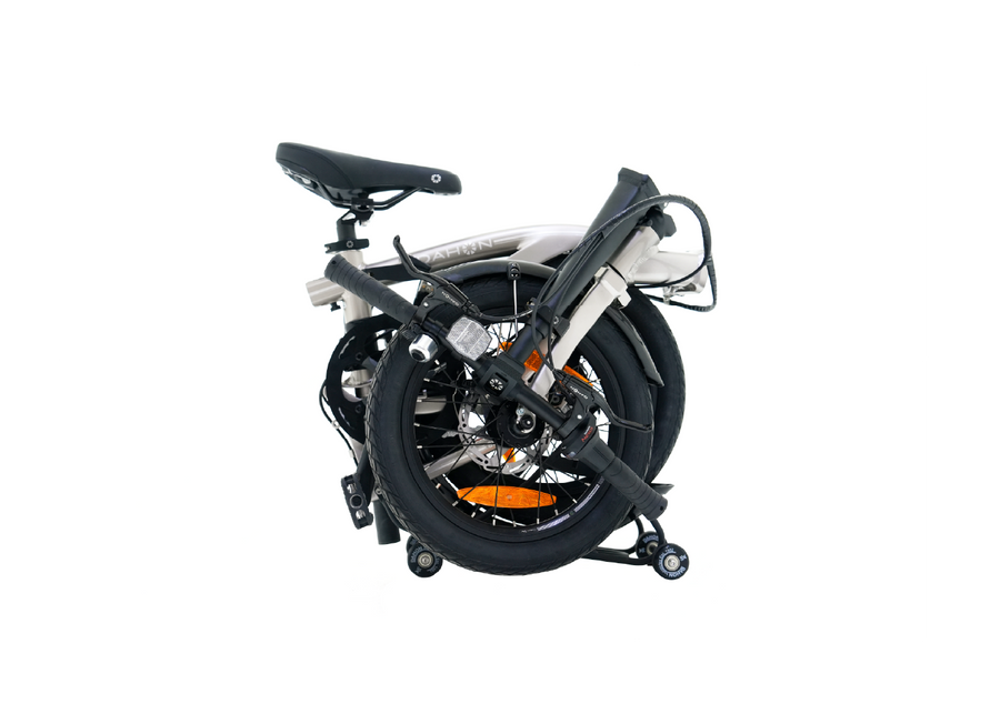 Compact folding bike folded with black frame, 16-inch wheels, saddle, and handlebars